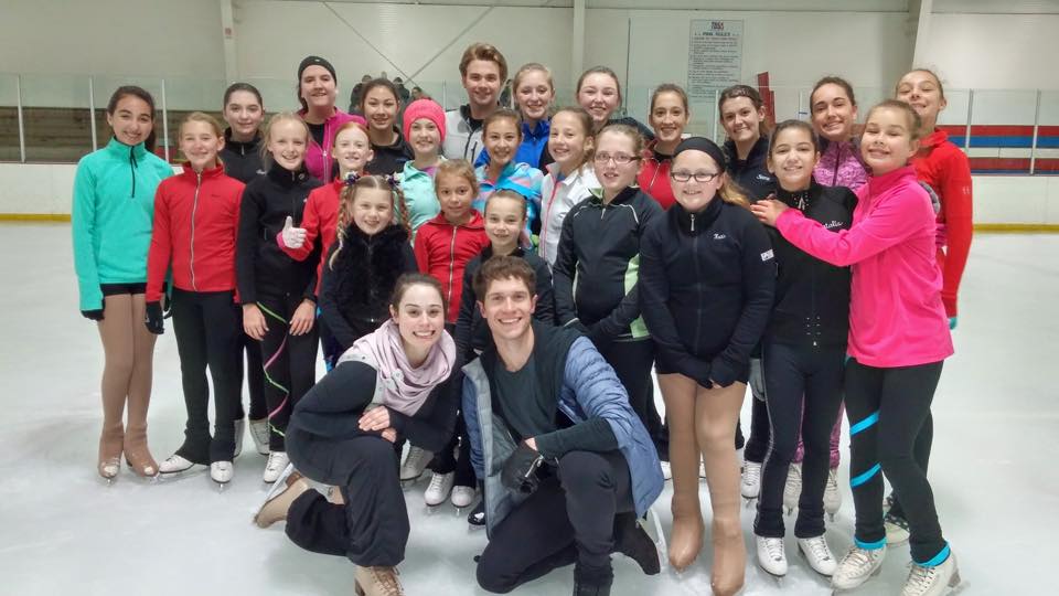 Kate McSwain & Drew Meekins with kids attending skating seminar in Tampa Bay